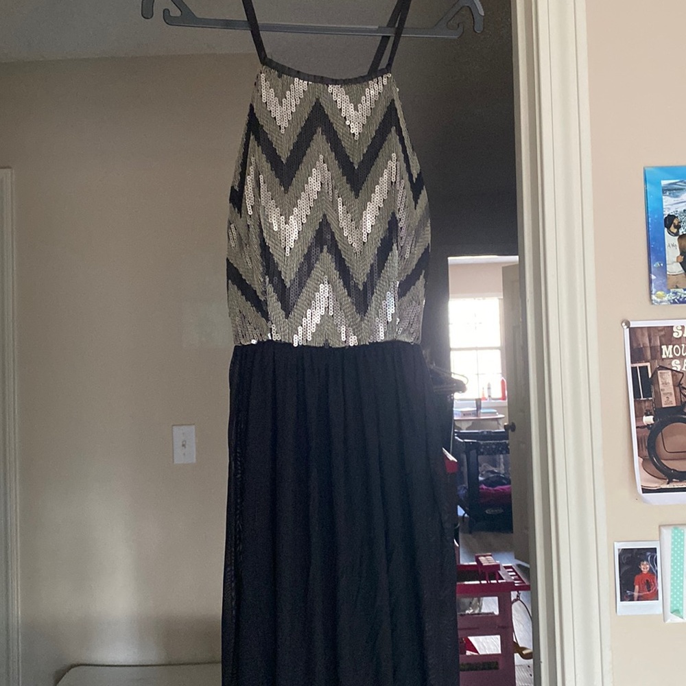 Size 6 black evening gown/long/brand name is Langhem